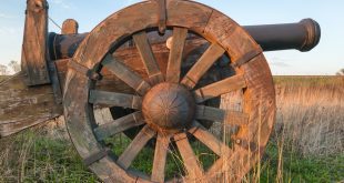 Large wooden wheel of an old cannon