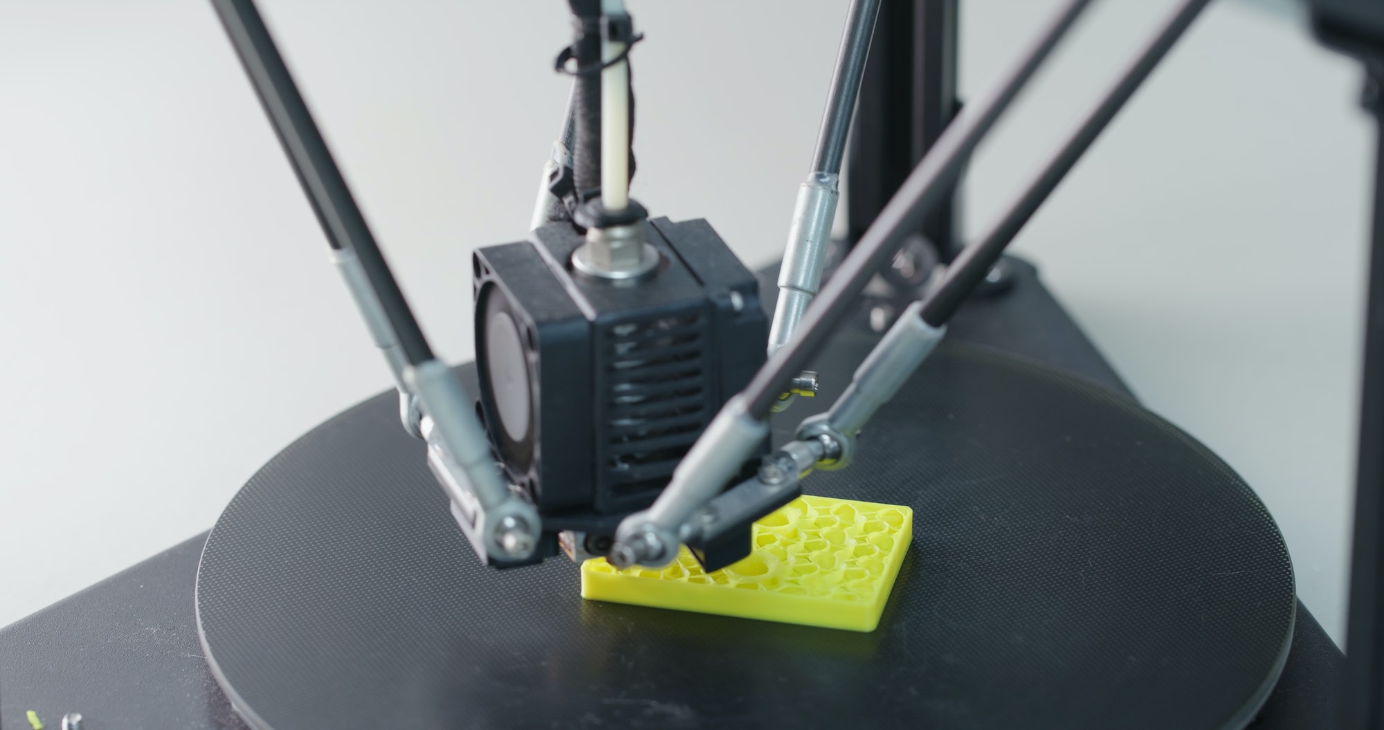 3D Printing Machine printing a piece of plastic