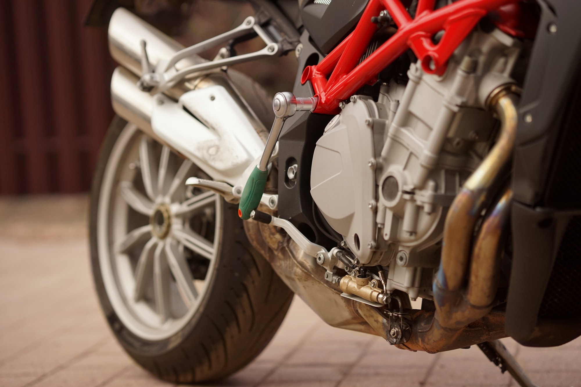 A motorbike standing at the repairing and maintenance service