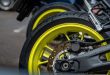 Closeup detail of motorcycle rear wheels and brake disc