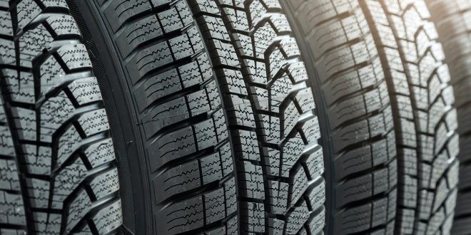 Detail of new winter tires for car with deep rubber patter to increase adhesion