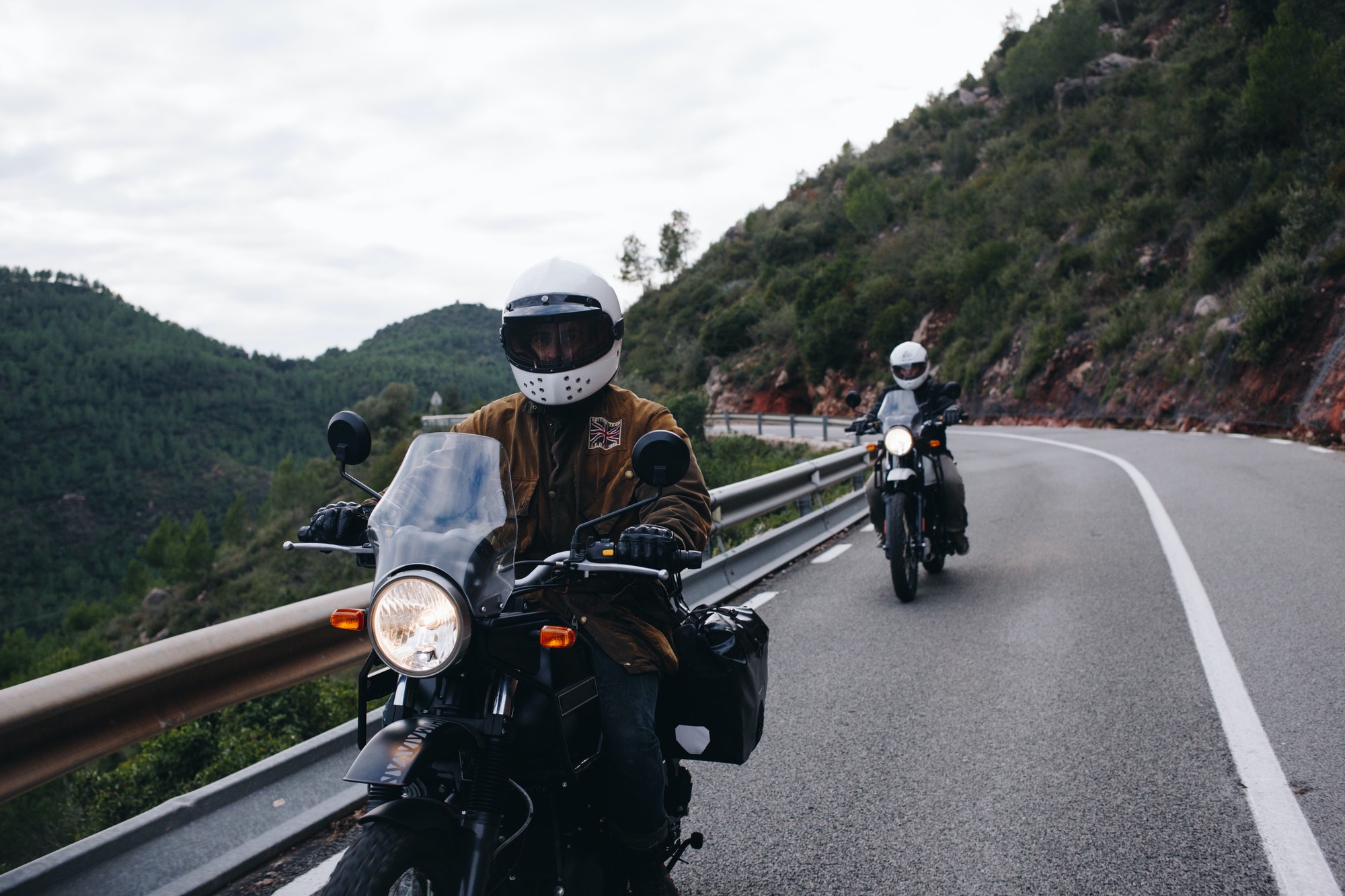 Group of motorcycle riders on mountain road