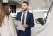 Handsome Car Salesman Selling Cars