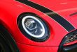 Headlight and grille of the new Mini Cooper automobile