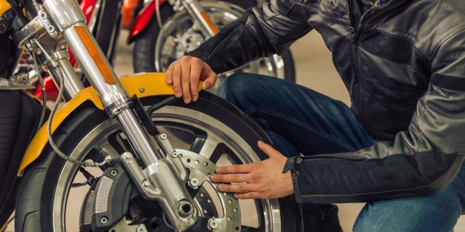 Man with motorbike