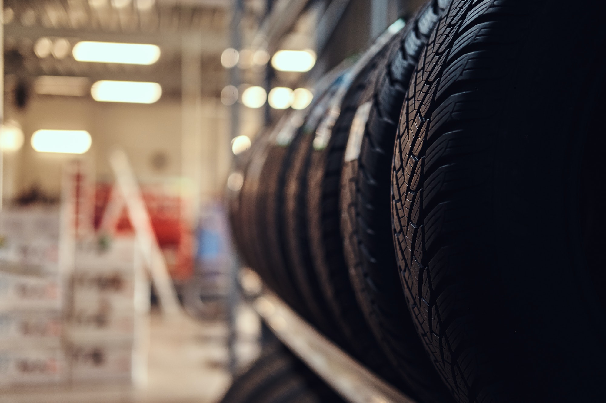 Variety of tyres at busy warehouse