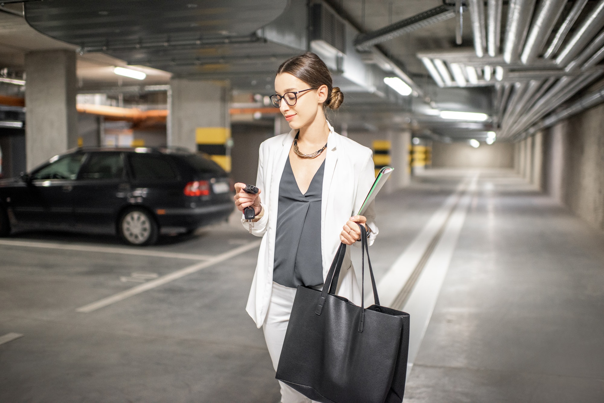 Woman in the underground car parking