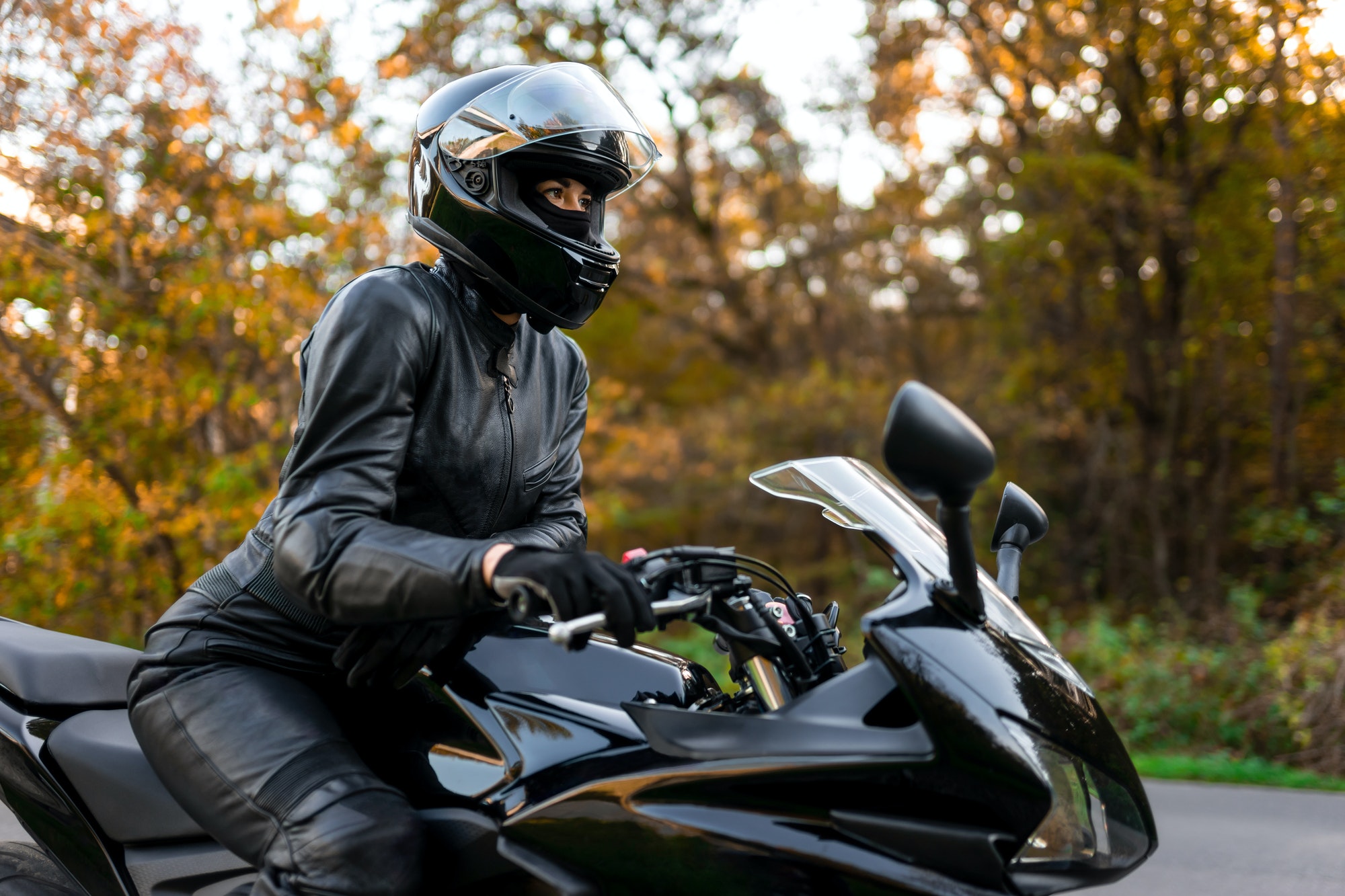 Young girl on a sports motorcycle