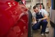 Mechanic Checking Car Tires