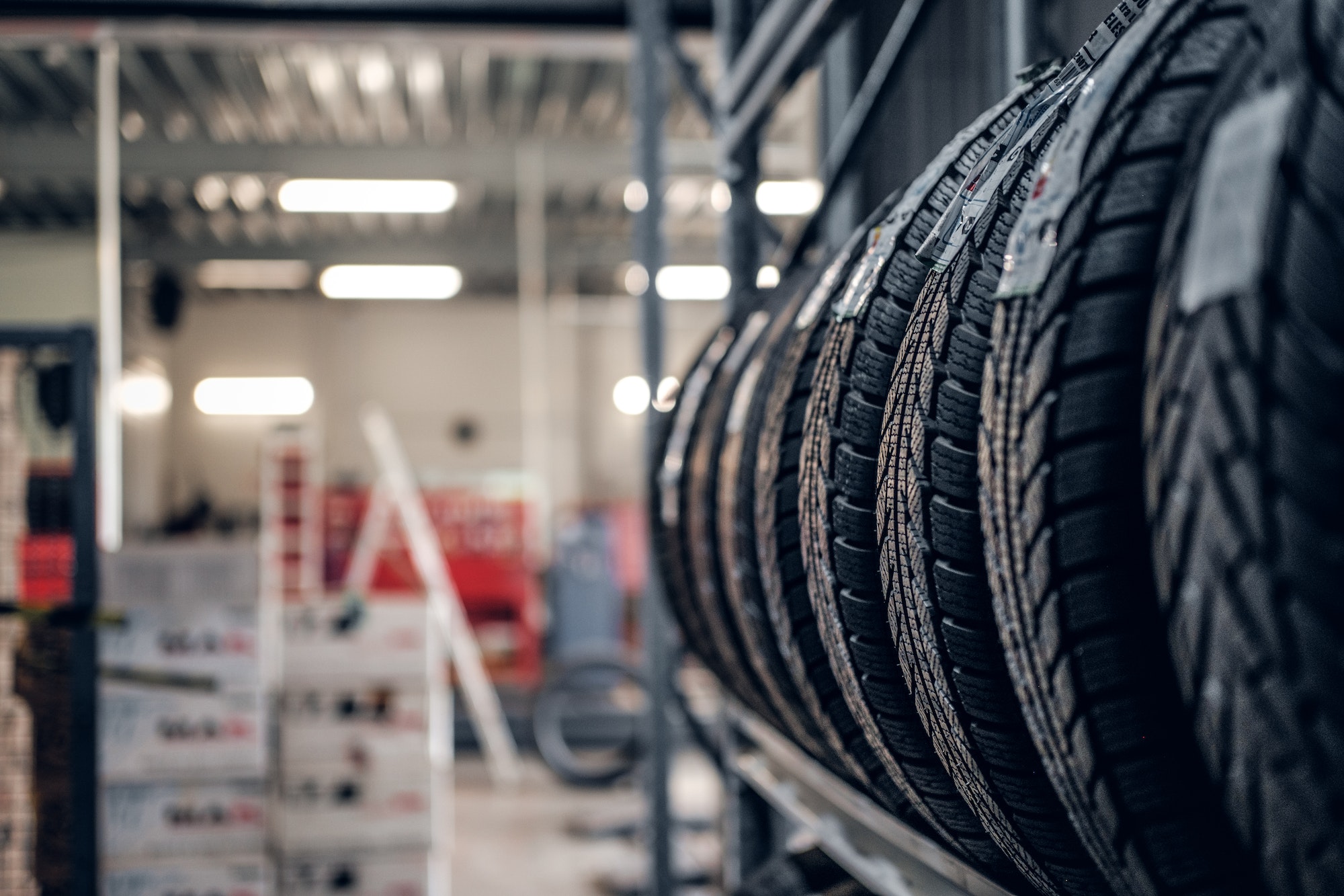 Variety of tyres at busy warehouse