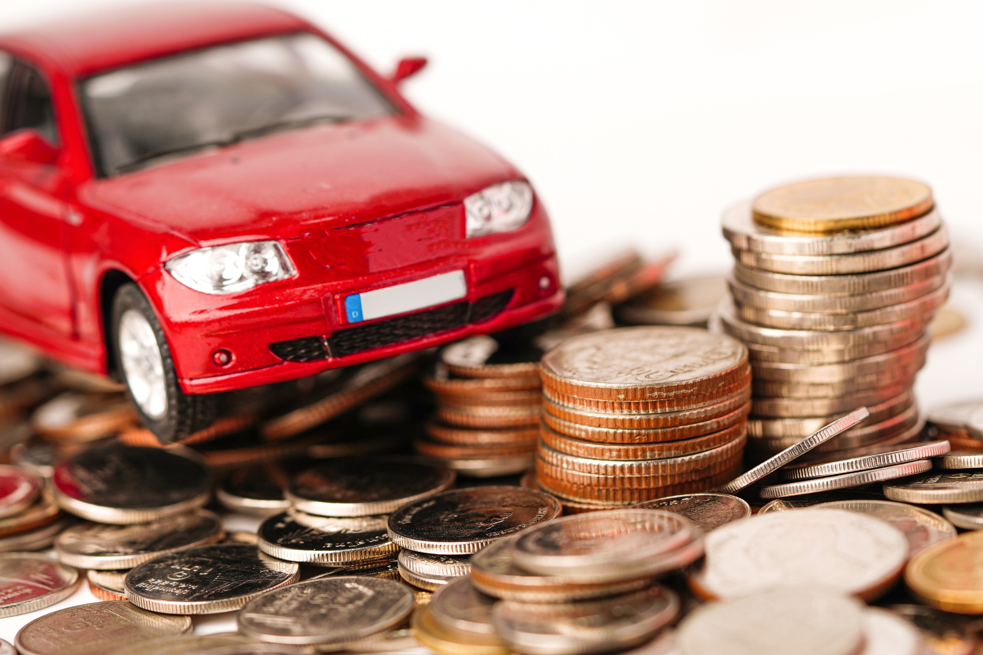 Car on coins background